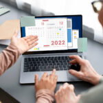Shared Google Calendar displayed on phone and laptop for remote family use